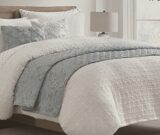 BQ11-White Dimpled w/blue coverlet